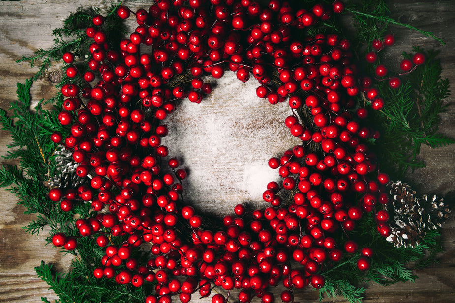 Red wreath on a brown background